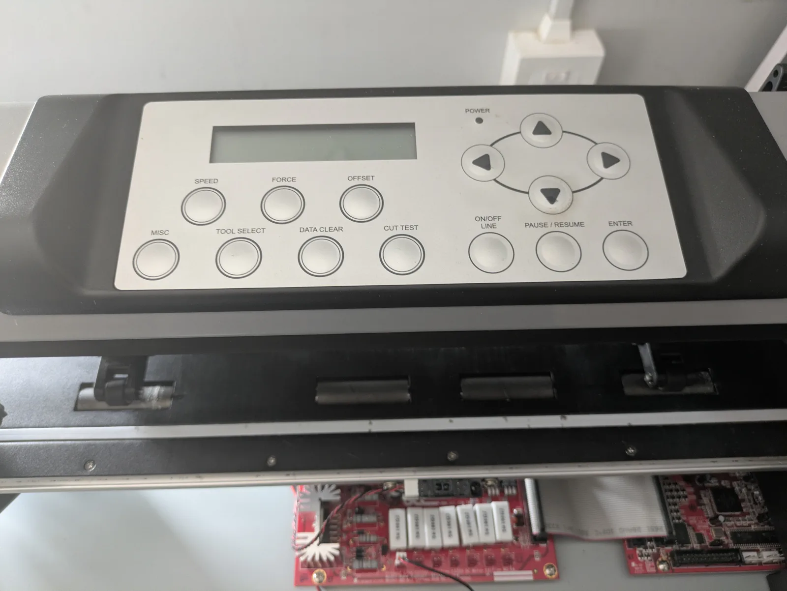 GCC Jaguar V control panel with internal electronics visible below